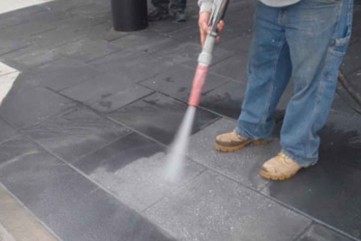 Coating Removal from Concrete Pavers utilizing Farrow System